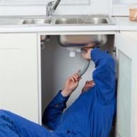Rise Above Plumbing Logo