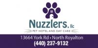 Nuzzlers Pet Hotel and Daycare logo